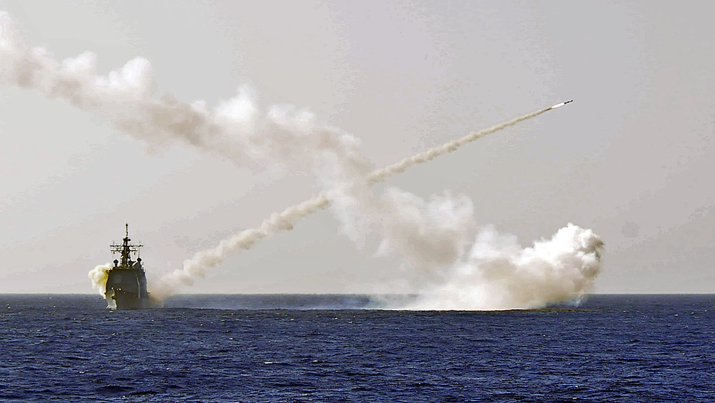 United States Navy warship underway at sea representing the community Navy Federal serves